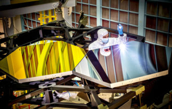 A NASA team has attached nearly all of the hexagonal segments that will together make the primary mirror for the James Webb Space Telescope (pictured are practice segments). Chris Gunn/NASA