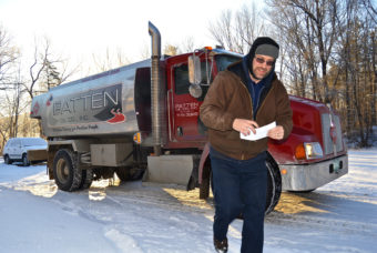 Rob Oberg delivers oil to a home in south central Vermont. He works for Keyser Energy in Proctor, Vt., which provides heating fuel to about 5,000 customers. Nina Keck/Vermont Public Radio