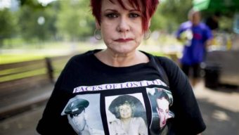 A woman at a Boston anti-drug rally wears a T-shirt showing family members killed by drug overdoses. As the country’s opioid epidemic worsens, few Americans are getting medication proven to be the best weapon against addiction. Getty Images