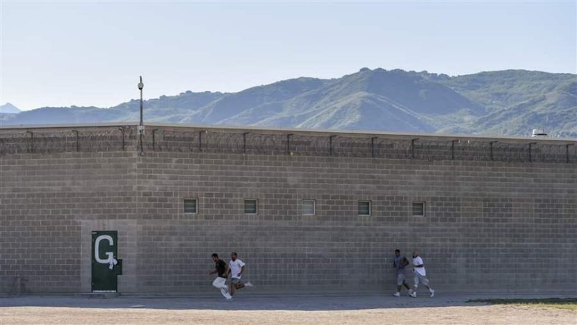 Prisoners run for exercise at a state prison in Utah. Many states are looking at new ways to reduce their prison population. Getty Images