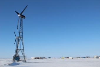 Kwigillingok has five wind turbines, four of which are currently working. (Photo by Rachel Waldholz/APRN)