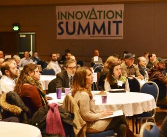 Audience members listen to speakers during the 2015 Innovation Summit at Juneau's centennial Hall. (Photo courtesy Governor's Office)