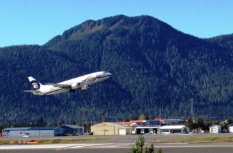 An Alaska Airlines jet takes off from Petersburg's airport in 2014. A Feb. 29, 2016, flight was struck by lightning. (Photo by Ed Schoenfeld/CoastAlaska News)