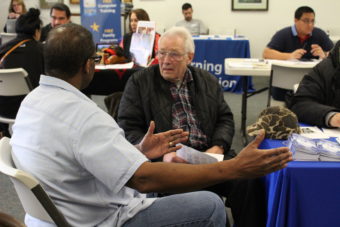A Wal-Mart employee talks to the Juneau Job Center. (Photo by Elizabeth Jenkins/KTOO)