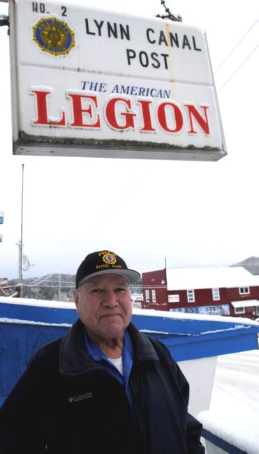 Ralph Strong, a 78-year-old Alaska Native veteran from Klukwan, poses outside the American Legion Hall in nearby Haines. (Photo by Jillian Rogers/KHNS).jpg