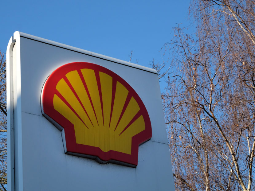 Royal Dutch Shell reported an 80 percent drop in earnings in 2015, but says it will still press ahead with the proposed mega-merger with BG Group plc. (Kirsty Wigglesworth/AP)