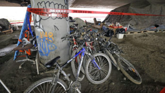 The area under Interstate 5 in Seattle where a shooting took place last week. Police say they've arrested three teenagers in the case. Elaine Thompson/AP