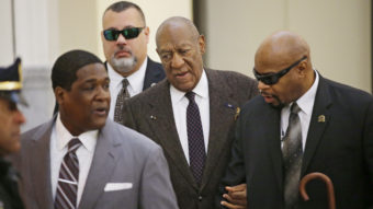 Bill Cosby arrives for a court appearance Wednesday in Norristown, Pa. The judge has ruled that the case against him will proceed, despite a claim that he was promised immunity a decade ago. Ed Hille/AP