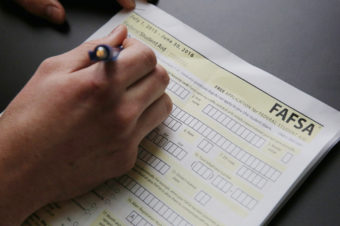 High school students fill out financial aid forms and are able to submit them as early as October. Elissa Nadworny/NPR