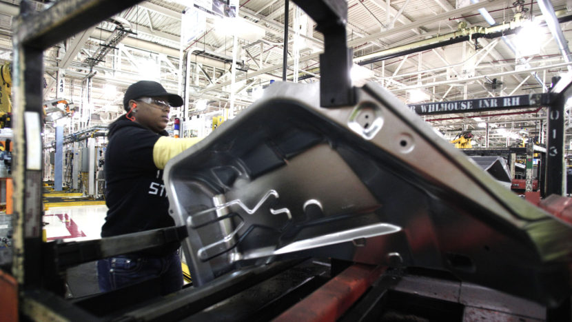 A worker is shown last month at the Fiat Chrysler Automobiles Warren Stamping Plant in Warren, Mich.