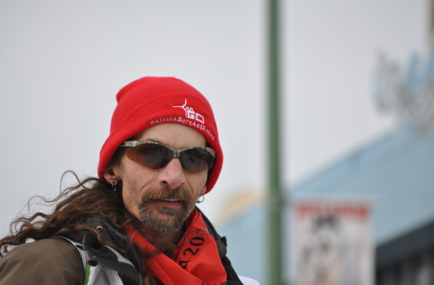 Lance Mackey at the Anchorage Ceremonial Start. In Rainy Pass, Mackey reported “a couple of dogs with sore wrists for no apparent reasons. (Photo by Zachariah Hughes/KSKA)