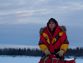 Iditarod musher Mitch Seavy pulls into McGrath