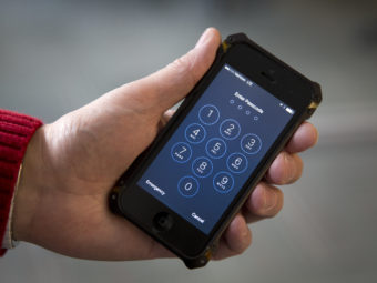 A judge agreed to the federal government's request to delay a court hearing scheduled for Tuesday in order to test a possible method for unlocking Syed Rizwan Farook's iPhone. Carolyn Kaster/AP
