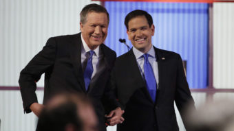 Marco Rubio's campaign is encouraging voters in Ohio to vote for its governor, John Kasich, on Tuesday in a strategic effort to stop Donald Trump. Chuck Burton/AP