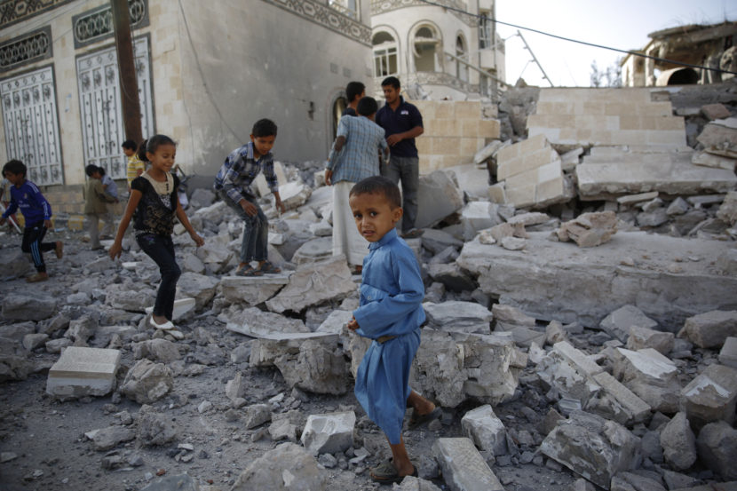 Children play amid the rubble of a house destroyed by a 2015 Saudi-led airstrike in Yemen's capital Sanaa. Hani Mohammed/AP
