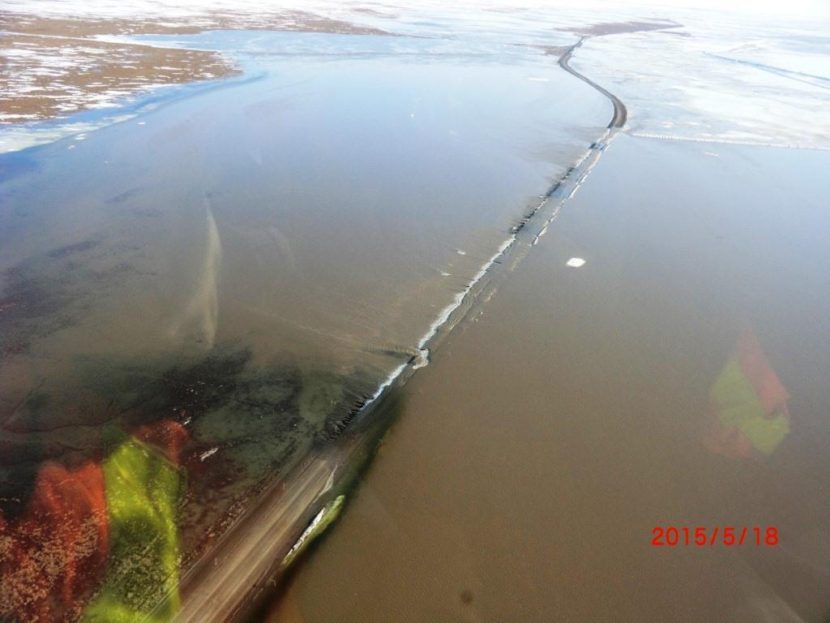 Sag River floodwaters submerged many stretches of the Dalton Highway, washing out some areas south of the Prudhoe Bay oilfield complex. Repair work by midsummer totaled about $43 million. (Photo courtesy of Alaska Department of Transportation)