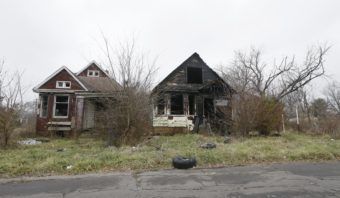 Abandoned homes molder on the east side of Detroit last year. Carlos Osorio/AP