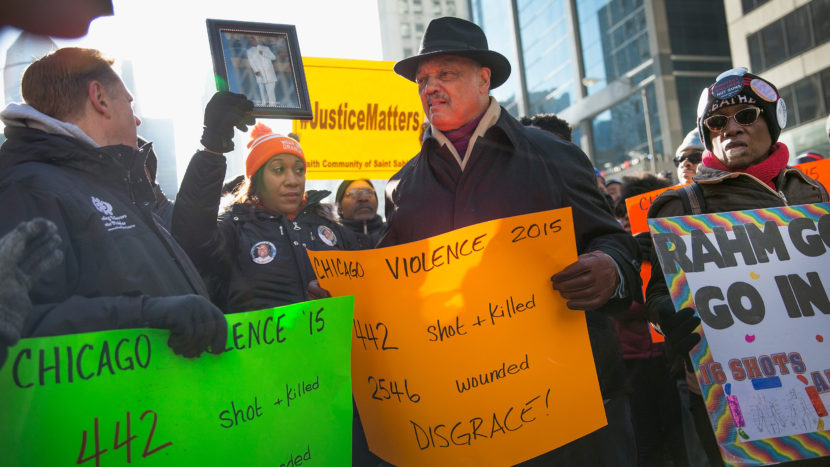 Demonstrators in Chicago call for an end to gun violence and resignation of Chicago Mayor Rahm Emanuel. Chicago police are under scrutiny following the release of a video showing the shooting of 17-year-old Laquan McDonald by a Chicago police officer. Scott Olson/Getty Images