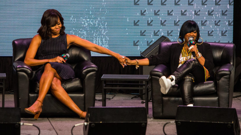 First lady Michelle Obama on stage with Missy Elliott during her SXSW keynote event on Wednesday, March 16. Drew Anthony Smith/Getty Images