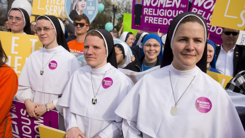 Supporters of religious organizations that want to ban contraceptives from their health insurance policies on religious grounds rallied outside the Supreme Court last week. Saul Loeb/AFP/Getty Images