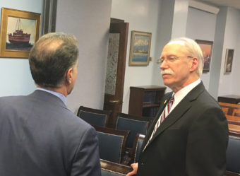 Former Fairbanks North Star Borough Mayor Luke Hopkins (right) discusses the Alaska Gasline Development Corporation with Sen. Peter Micciche, March 28, 2016. (Photo by Andrew Kitchenman/KTOO/Alaska Public Media)