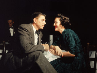 Actor Ronald Reagan and his wife, Nancy, gaze at one another across a table in 1952. Hulton Archive/Getty Images