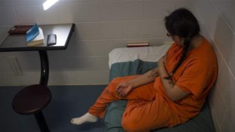 An Oglala Lakota teenager sits in a juvenile detention center in Kyle, South Dakota. Native American girls are five times more likely than white girls to be incarcerated in juvenile facilities. The Washington Post via Getty Images