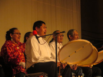 Drummers and singers perform from the Barrow Dance Group. (Photo by Laura Kraegel/KNOM)