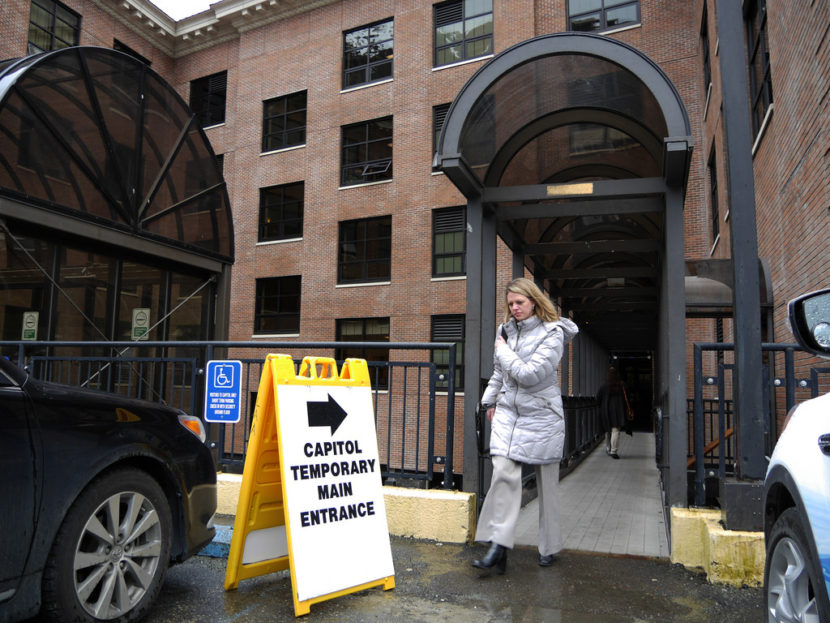 Kara Moriarty, president and CEO of the Alaska Oil and Gas Association, exits the Capitol's temporary main entrance on 5th Street, April 18, 2016. The building's front entrance was closed shortly after the scheduled end of the regular legislative session due to previously planned renovations to the exterior of the building. (Photo by Skip Gray/360 North)