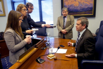 Rep. Chris Tuck, D-Anchorage, takes questions from reporters April 19, 2016. Rep. Sam Kito III, D-Juneau, stands to his right. Reporters, front to back, are Liz Raines of KTVA, Becky Bohrer of the Associated Press and Andrew Kitchenman of Alaska Public Media and KTOO. (Photo by Skip Gray/360 North)