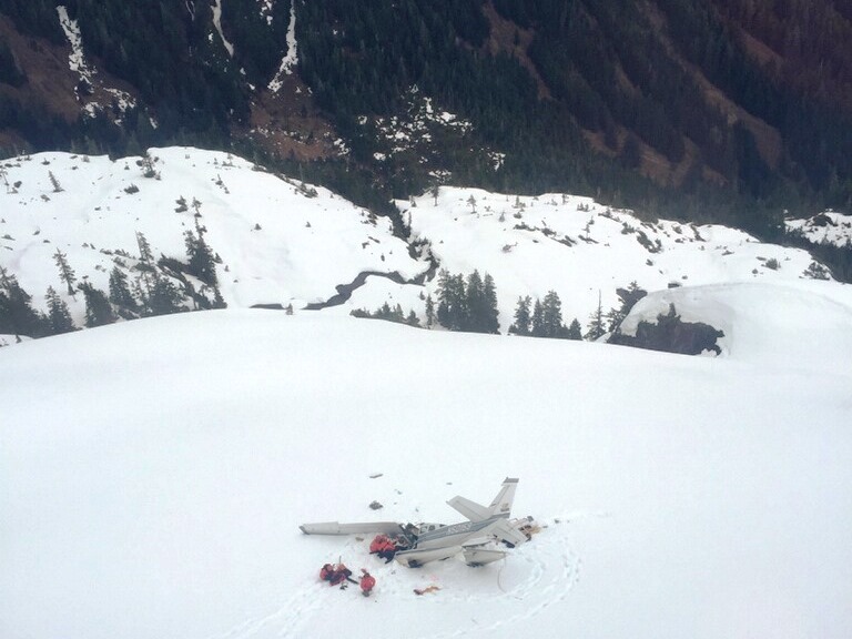 Rescuers work at the site of a crashed small plane on Admiralty Island on April 8. (Photo courtesy Sitka Mountain Rescue)
