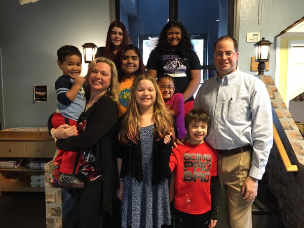 Princess Taala (center, orange shirt), Crystal Stone (front left) and their family. (Photo by Hillman/KSKA)