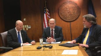 Gov. Bill Walker, flanked by Tax Division Director Ken Alper and Revenue Commissioner Randall Hoffbeck. Walker discussed oil and gas tax credits. (Photo by Andrew Kitchenman/KTOO)