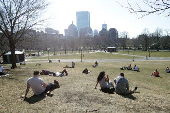 People in Boston enjoyed a late winter heat wave this past March. In much of the U.S., climate change is causing winters to warm faster than summers. Suzanne Kreiter/Boston Globe via Getty Images