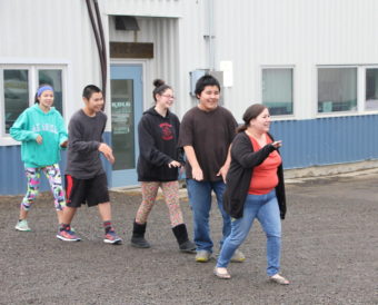 Dillingham students dance on a drizzly afternoon to take a break from their classroom. That would count toward a new physical activity standard for kindergarten through eighth graders that was proposed by lawmakers, but counting it up could be tricky. (Photo by Molly Dischner/KDLG)