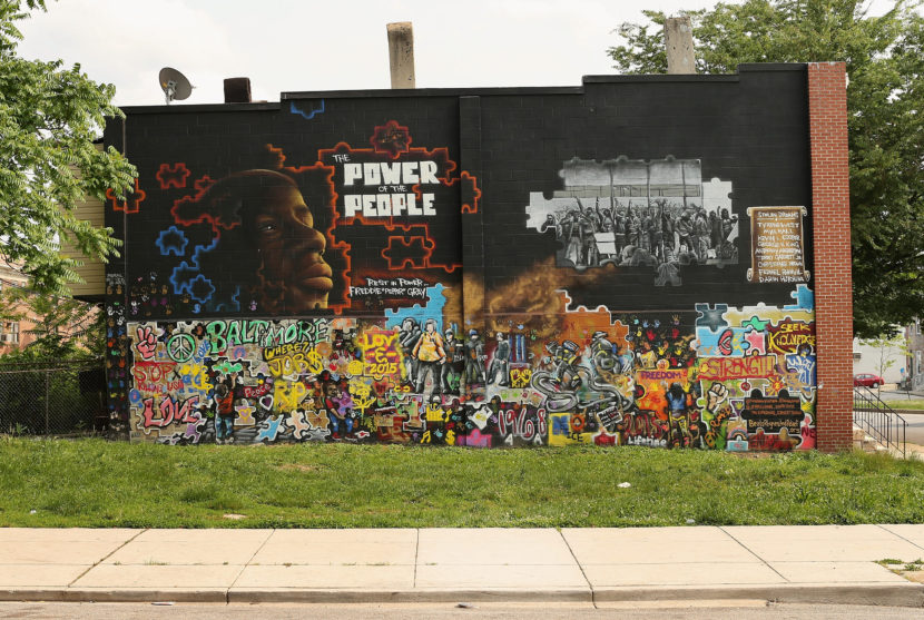A mural memorializing Freddie Gray is painted on the wall near the place where he was tackled and arrested last year by police at the Gilmor Homes housing project in Baltimore, Md. Chip Somodevilla/Getty Images
