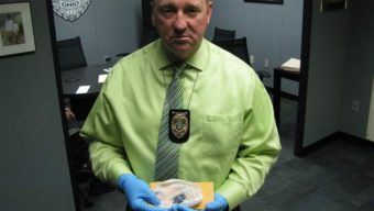 Bill Collins, police chief in Marion, Ohio, holds “blue drop” heroin laced with the painkiller fentanyl. Overdose deaths caused by fentanyl are surging. AP