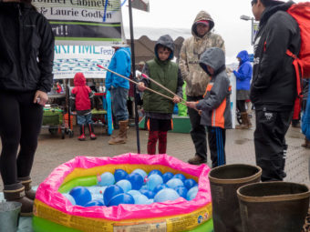 Children participate in a game at the 2016 Juneau Maritime Festival (Photo by David Purdy/KTOO)