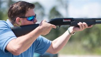 iGun Technology owner Jonathan Mossberg demonstrates his smart shotgun, which will only fire when in close proximity to a ring he is wearing. He would like to develop a smart handgun for the public, and so would some gun safety advocates. AP