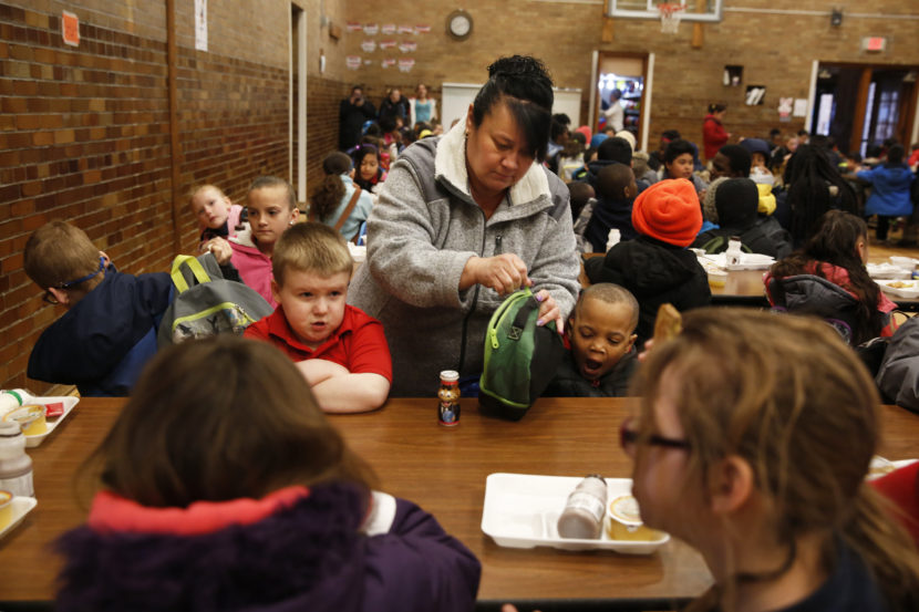 Cyndy Bulson now volunteers at Stocking, helping monitor kids in the morning, serving breakfast and chaperoning field trips. (Photo by Elissa Nadworny/NPR)
