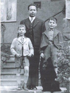 John Fieldsend (left), age 7, with his father, Curt Feige, and older brother, Arthur, age 10, in the final photograph taken of them together in 1939, on the day the boys boarded a Kindertransport train bound for England. Curt Feige and his wife, Trude, were murdered by the Nazis at Auschwitz in 1943. Courtesy of John Fieldsend