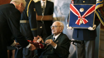 Czech Republic's President Milos Zeman (left) decorates Nicholas Winton with the Czech Republic's highest decoration, The Order of the White Lion, in Prague, on Oct. 28, 2014. Winton, a British citizen who died last year at age 106, saved 669 mostly Jewish children from the Nazis by transporting them out of Prague to Great Britain in 1939. Petr David Josek/AP