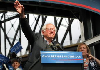 Democratic presidential candidate Bernie Sanders waves to the crowd after arriving Tuesday at a campaign rally at the Big Four Lawn Park in Louisville, Ky. John Sommers II/Getty Images