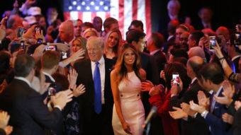 Donald Trump and his wife, Melania, arrive to speak to supporters at Trump Tower in New York following his victory in Indiana Tuesday. Improbably, Trump is now assured of being the GOP nominee. Spencer Platt/Getty Images