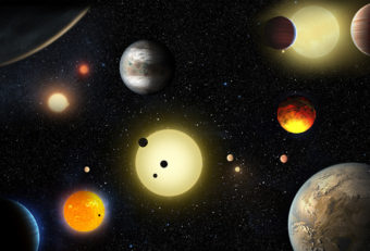 This artist's concept depicts some of the planetary discoveries made by NASA's Kepler Space Telescope. Tuesday's announcement more than doubles the number of verified planets discovered by the Kepler mission. W. Stenzel/NASA
