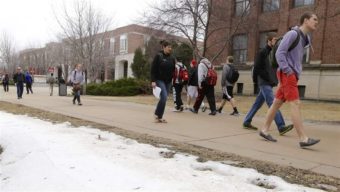 Students cross the University of Nebraska campus. A new Nebraska law requires colleges to send students estimates of their cumulative student loan debt. (Photo courtesy of Pew Charitable Trusts)