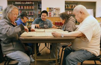 Elders play bingo at the ONC Senior Center. (Photo by Dean Swope/KYUK)