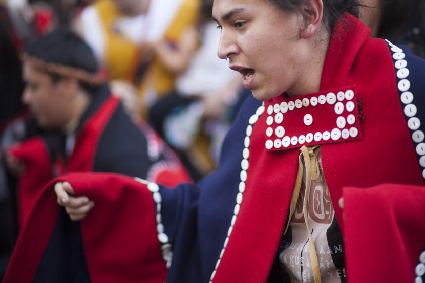 Naawéiyaa Tagaban, Lingít from Juneau, dances during a processional and grand entrance on Wednesday, June 8, 2016, near Juneau, Alaska. Celebration is a biennial festival of Lingít, Haida and Tsimshian tribal members put on by the Sealaska Heritage Institute. (Photo by Rashah McChesney/KTOO)