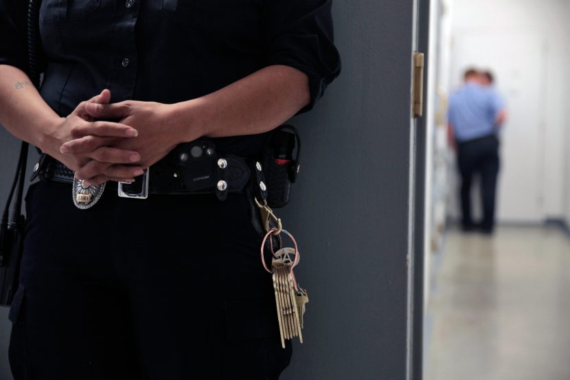 Corrections officers wait outside of a cell during a weekly inspection at the Lemon Creek Correction Center on June 18, 2016 in Juneau, Alaska. (Photo by Rashah McChesney/KTO