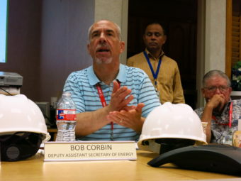 Robert Corbin (left), deputy assistant energy secretary for the Office of Petroleum Reserves, speaks at the Bryan Mound site near Freeport, Texas, on June 9. He says the Strategic Petroleum Reserve fills a vital economic role.